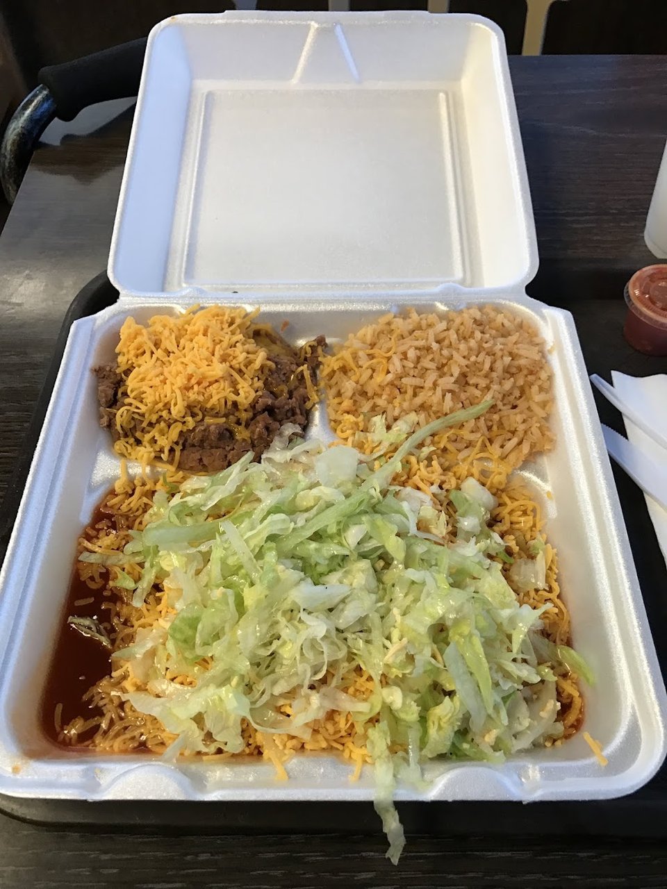 Restaurant menu featuring salads, combinations, and kids meals.